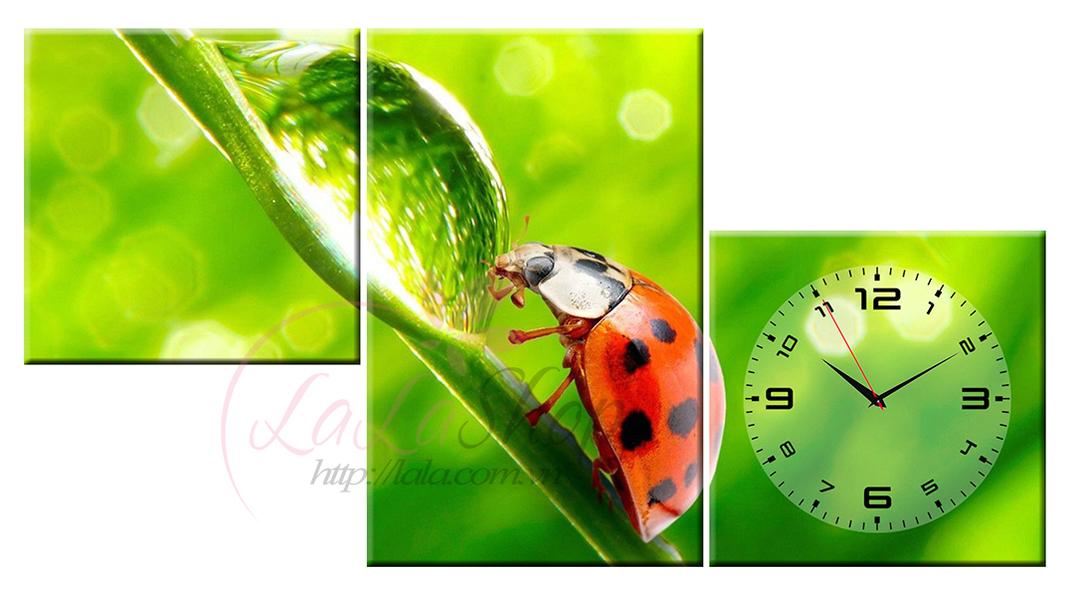 Tranh đồng hồ cánh cam cách điệu