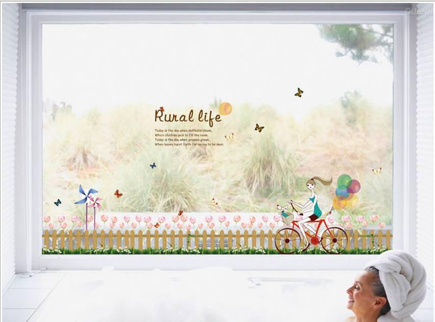 Decal dán tường hàng rào cô bé xe đạp