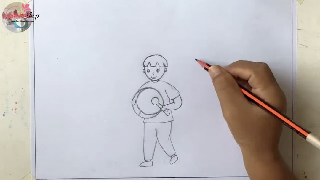 Đầu tiên các bạn vẽ bé trai tay cầm trống
