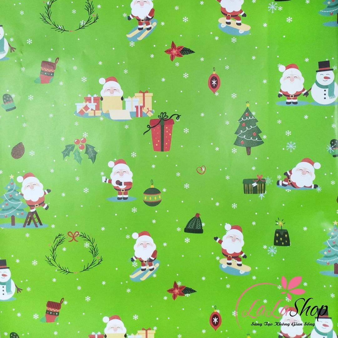 Giấy gói quà ông già noel cây thông họa tiết noel nền xanh
